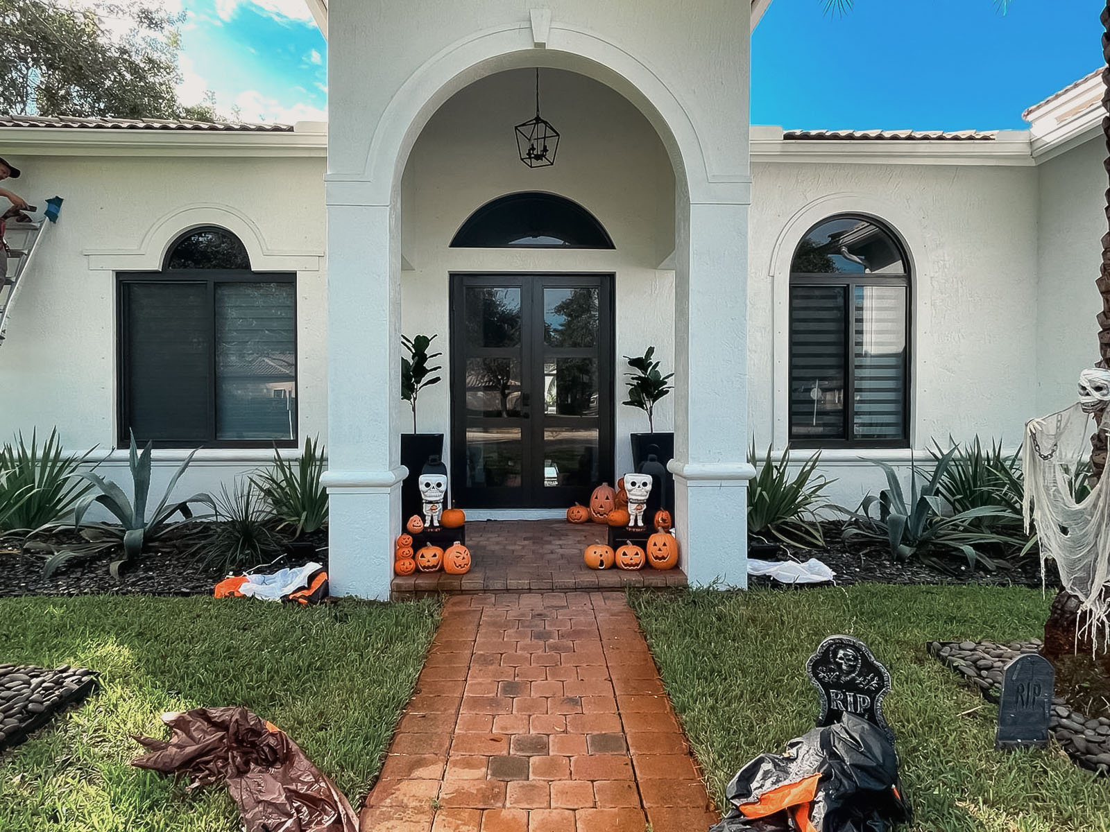 Orlando home before impact window upgrade — original windows and plain entry